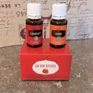 Young Living car vent diffuser with “Orange” and “Lemongrass” essential oils